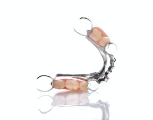 False teeth on white background.